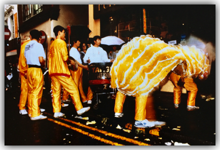 Members of the Lion Dance having a rest